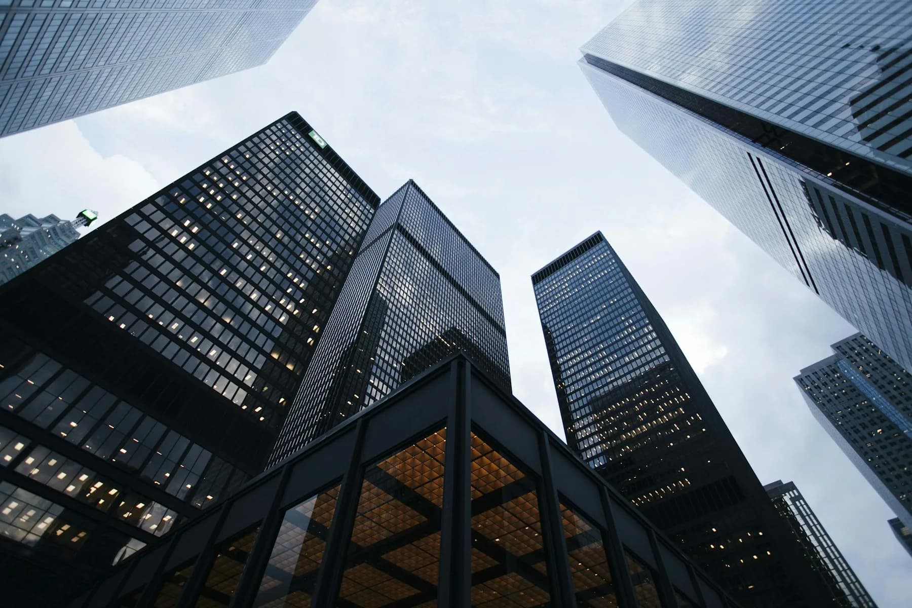 Glass skyscrapers in a financial district, photographed from street level